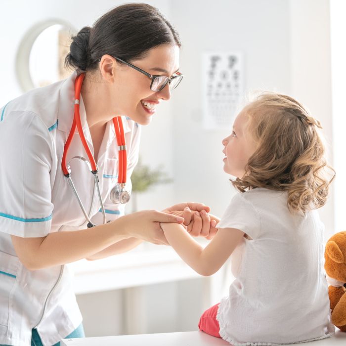 Doctor examining a child
